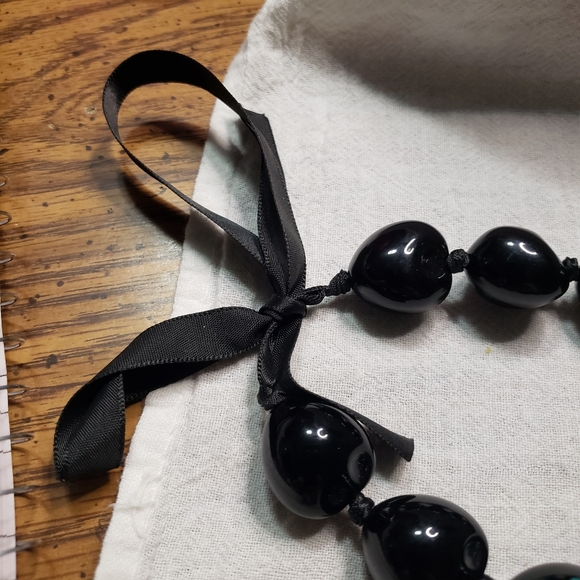 Beautiful Black Chunky Hawaiian Kukui Nut Lei Necklace with Ribbon Closure - Picture 7 of 8